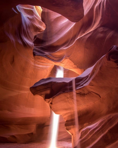 Antelope canyon lit by sunbeams